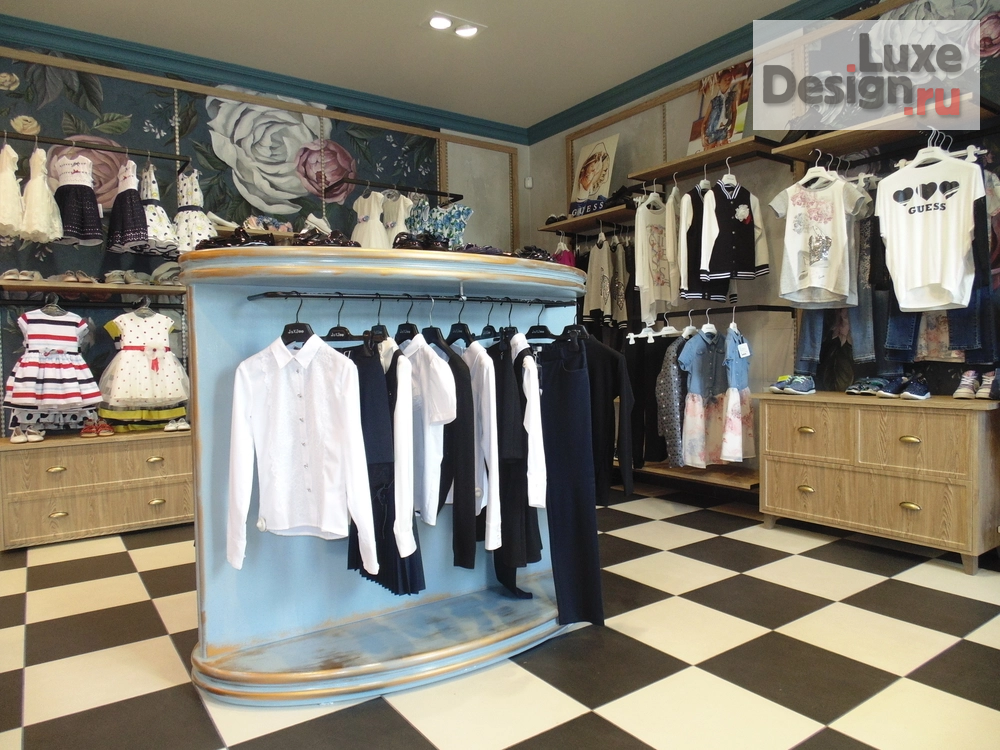 Дизайн интерьера шоу-рума "Магазин детской одежды Bambini в Челябинске" (фото 4)
